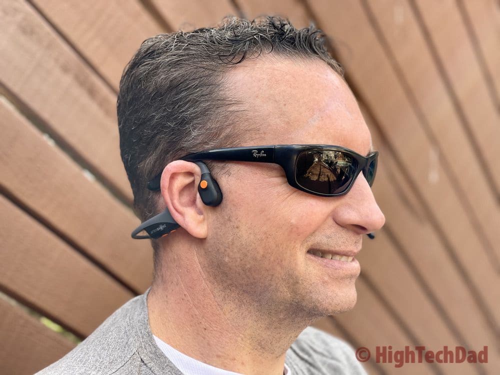 Open ear design of the AfterShokz OpenComm headset - using bone conduction technology - HighTechDad review