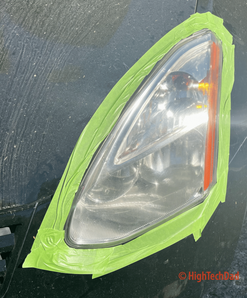 Tape around the headlights - QUIXX Headlight Restoration Kit - HighTechDad Review