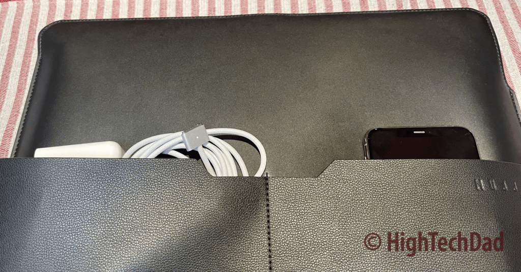 Smartphone and charger in front pockets - Mujjo Envoy laptop sleeve - HighTechDad review